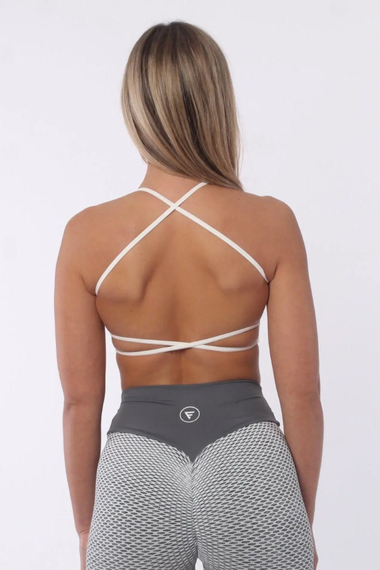 https://empowerclothing.co.uk/cdn/shop/files/Nakd-Collection---Cross-Back-and-Open-Back-Sports-Bra-in-White-Empowerclothingltd-Empowerclothingltd-1684499543.jpg?v=1699822344