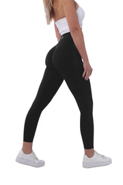 The Nakd Scrunch Collection - Woman in high-waisted gym leggings, close-up shoe detail.