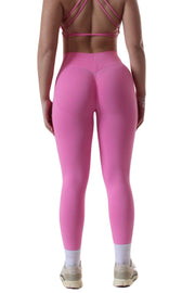 Self Love Collection by Jessica West V Back scrunch bum leggings on a woman, close-up of feet and shoe.